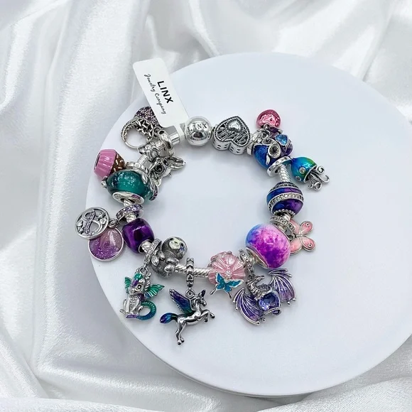 Linx Snake Chain Bracelet with Whimsical Animal Themed Charms